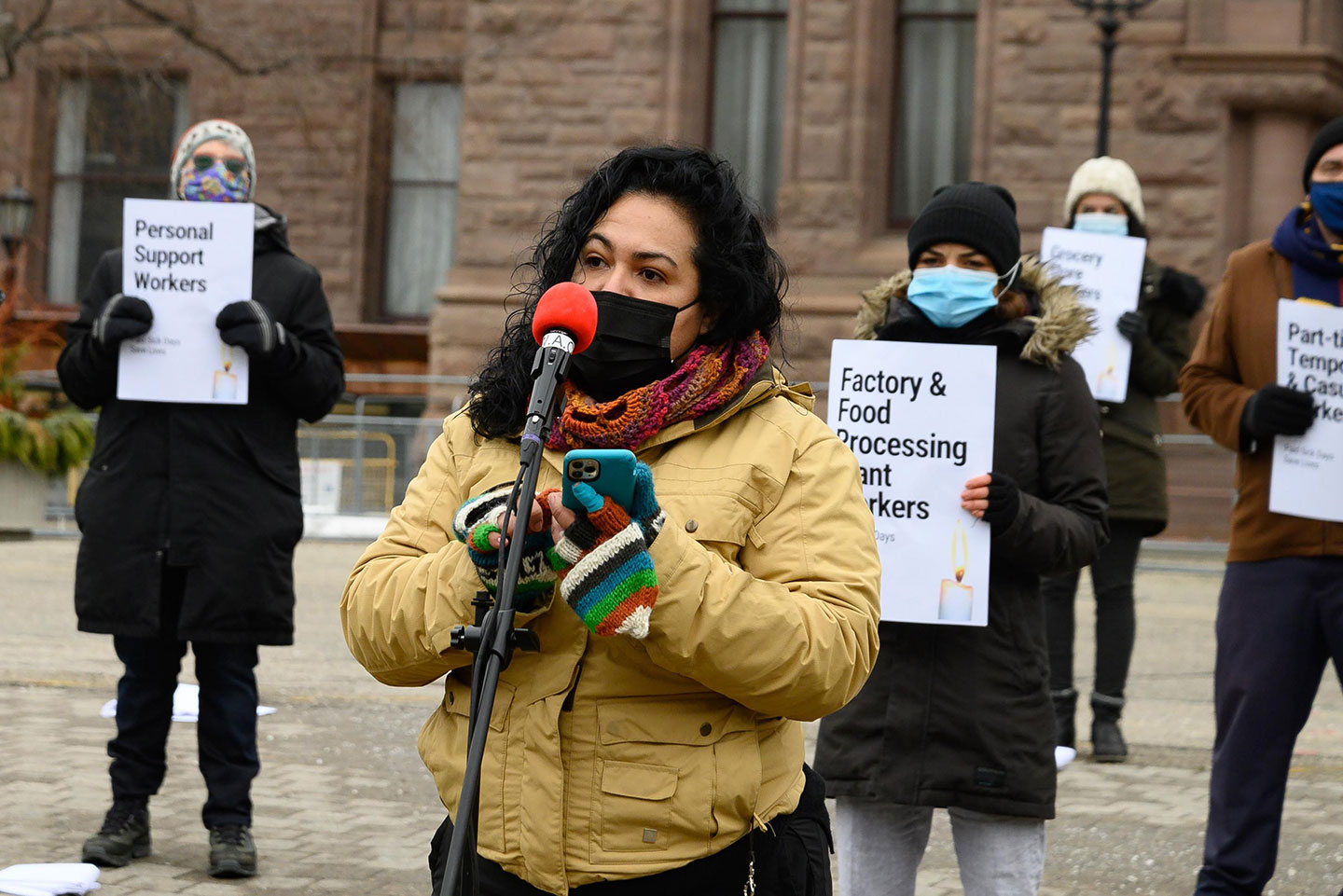 Veronica Zaragoza, an organizer with the Workers’ Action Centre, speaking on the need for permanent paid sick days outside Queen's Park. Photo: Jared Ong